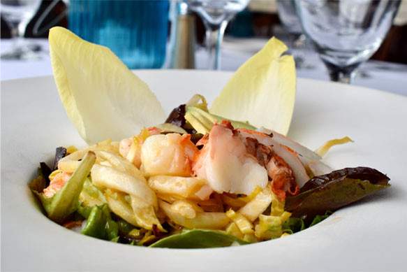 scallops over steamed vegetables